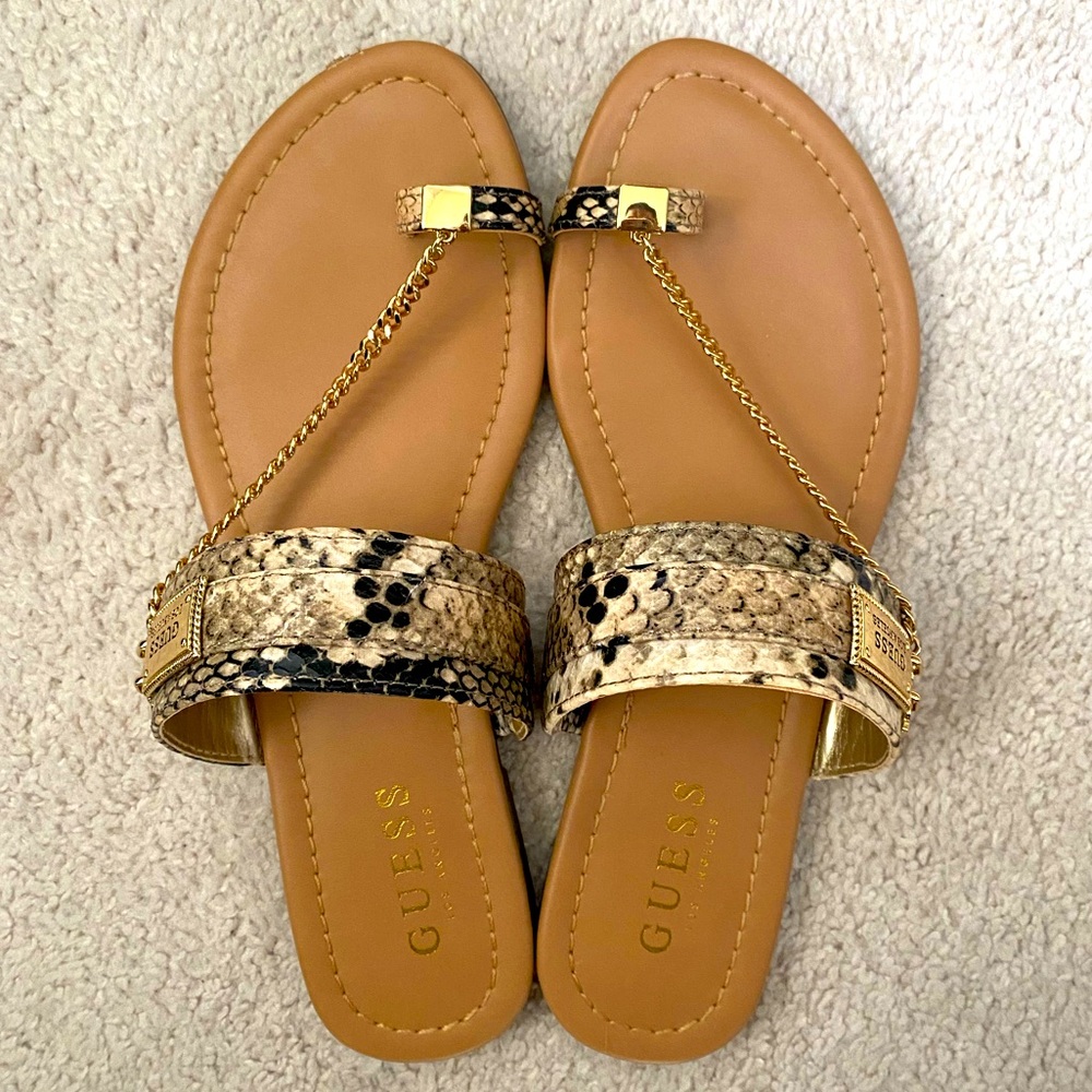 Guess snake print flats with gold chain and details.